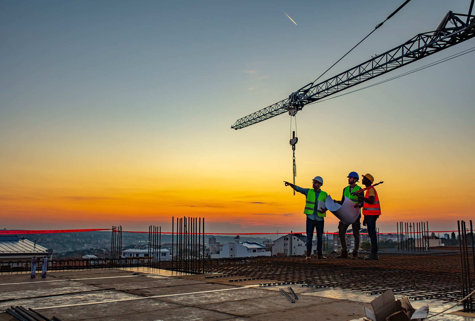 Construction workers with crane