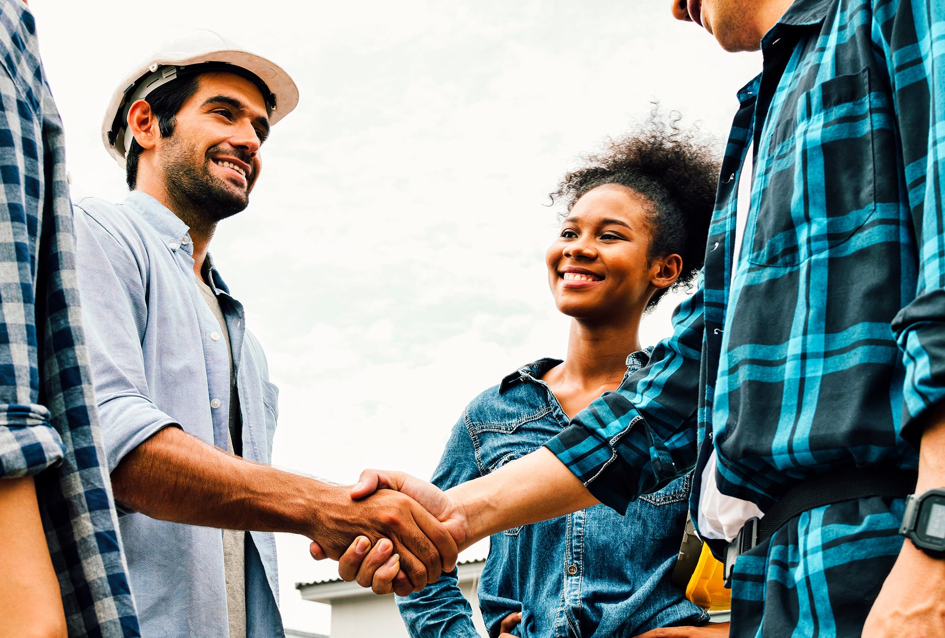 Contractor shaking hands with client
